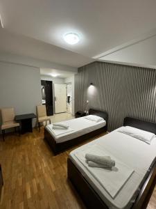 Voodi või voodid majutusasutuse Apartments Philip II toas
