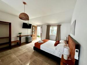 Cama ou camas em um quarto em Eco-Hotel Palma É Coco