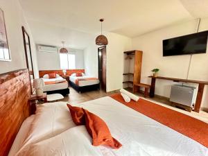 Cama ou camas em um quarto em Eco-Hotel Palma É Coco