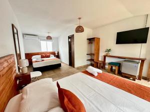 Cama ou camas em um quarto em Eco-Hotel Palma É Coco