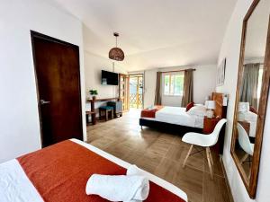 Cama ou camas em um quarto em Eco-Hotel Palma É Coco