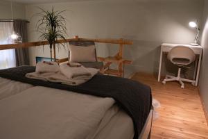 A bed or beds in a room at La Bella - Entire Apartment near Gozsdu udvar