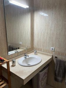 Koupelna v ubytování Arcoiris Paradise A 300 metros de la playa ,piscina y parque infantil