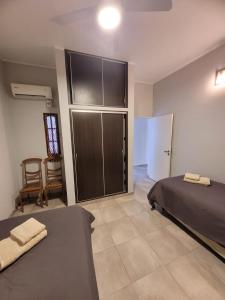 Postel nebo postele na pokoji v ubytování EL departamento con estilo + 23 fotografií