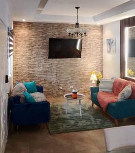 Posezení v ubytování Hermoso apartamento a 2 minutos de la feria de David