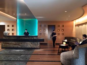 Členové personálu v ubytování Mandarin Oriental, Boston
