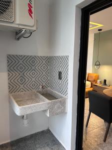 a bathroom with a sink in a room at Mako 235 in Tepic +32 photos