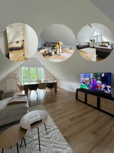 Μια τηλεόραση ή/και κέντρο ψυχαγωγίας στο Familiendomizil am Meer - Erholung pur an der Ostsee!W3