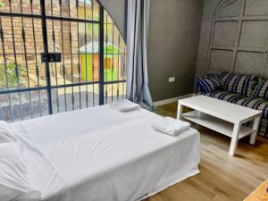Posteľ alebo postele v izbe v ubytovaní Villa Alamos Jerez I Piscina Salada Climatizada I BBQ I Jardines I 850m2