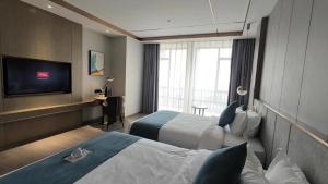 Guangzhou'daki Poltton International Apartment Guangzhou Panyu Political Affairs Center Branch tesisine ait fotoğraf galerisinden bir görsel