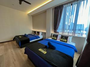 Postel nebo postele na pokoji v ubytování Hotel Lavie at Centrum