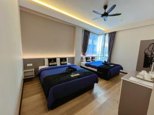 Postel nebo postele na pokoji v ubytování Hotel Lavie at Centrum