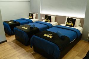 Postel nebo postele na pokoji v ubytování Hotel Lavie at Centrum