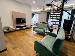 TV a/nebo společenská místnost v ubytování Hotel Lavie at Centrum