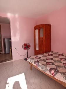 Giường trong phòng chung tại Kelsey Homestay