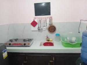 Nhà bếp/bếp nhỏ tại Kelsey Homestay