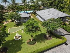 an aerial view of a house with trees in a yard at Grande Sun Seaside Villas Koh Chang in Ban Dan Kao +59 photos