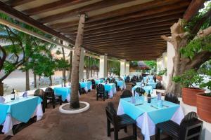 Majoituspaikan Grand Oasis Palm - All inclusive ravintola tai vastaava paikka