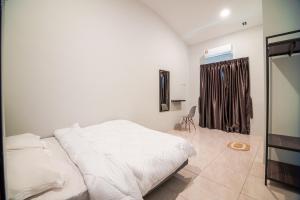 Postel nebo postele na pokoji v ubytování Serenity Family Stay Ipoh 8 pax + 20 fotografií