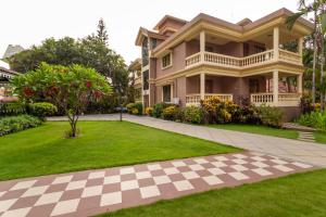 Aed väljaspool majutusasutust De Mandarin Beach Resort Suites & Villas, Candolim