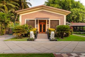Zahrada ubytování De Mandarin Beach Resort Suites & Villas, Candolim