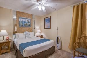 Ένα ή περισσότερα κρεβάτια σε δωμάτιο στο Paki Maui #318 condo +4 φωτογραφίες