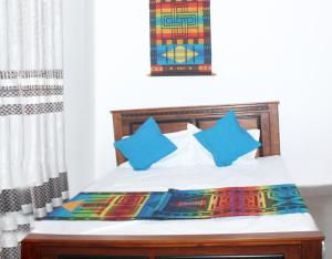 Postel nebo postele na pokoji v ubytování Adi Residences