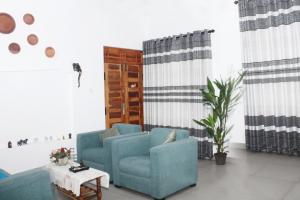 Posezení v ubytování Adi Residences