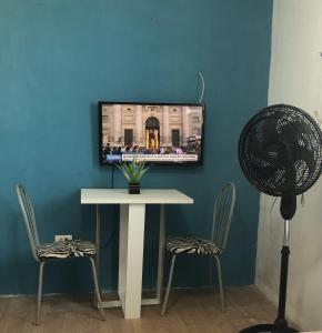 TV a/nebo společenská místnost v ubytování Olinda Home + 12 fotografií