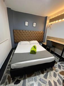 HOTEl AIRPORT PEREIRA客房内的一张或多张床位