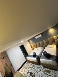 HOTEl AIRPORT PEREIRA客房内的一张或多张床位