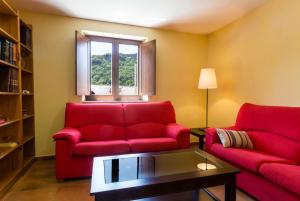 Posezení v ubytování Hotel Rural Somiedo