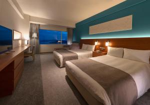Postel nebo postele na pokoji v ubytování Setouchi Kojima Hotel Kurashiki + 35 fotografií