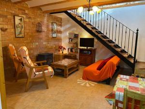 Χώρος καθιστικού στο CASA AIDAN rural acogedora con vistas de montaña