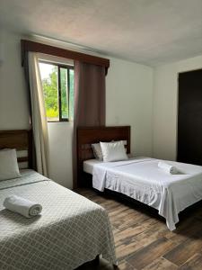 Postel nebo postele na pokoji v ubytování Hotel Miriam Bacalar + 37 fotografií
