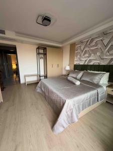 Voodi või voodid majutusasutuse Datca Suites Luxury Boutuiqe Hotel toas