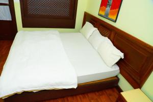 Katil atau katil-katil dalam bilik di Lake Twenty Thousand Farm and Retreat, LTK - Haweli