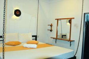 Postel nebo postele na pokoji v ubytování Pepper Garden villa