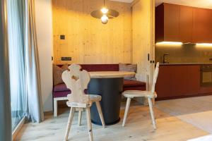 Kuchyň nebo kuchyňský kout v ubytování Appartements zi Ranna