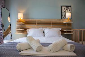 Ένα ή περισσότερα κρεβάτια σε δωμάτιο στο Theros Aegean Villa