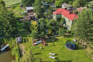 an aerial view of a house with a yard at A morze! Agroturystyka Nowy Kraków pod Darłowem in Jeżyce