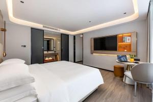 Photo de la galerie de l'établissement Poltton International Apartment - Foshan Gaoming Yingxin Plaza, à Foshan