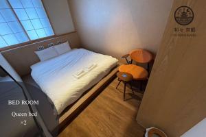 Postel nebo postele na pokoji v ubytování 利々 京都 lili hotel kyoto