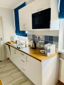 Kuchnia lub aneks kuchenny w obiekcie Apartament Łazienna River View AC Progres
