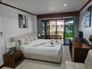 Ένα ή περισσότερα κρεβάτια σε δωμάτιο στο Sai Rougn apartment +242 φωτογραφίες