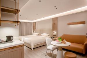 Photo de la galerie de l'établissement Poltton International Apartment - Foshan Gaoming Yingxin Plaza, à Foshan