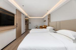 Photo de la galerie de l'établissement Poltton International Apartment - Foshan Gaoming Yingxin Plaza, à Foshan