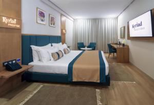 Postel nebo postele na pokoji v ubytování Kyriad Prestige City Center Tunis + 23 fotografií