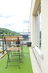 Балкон или терраса в TheSkyFall , cosy appartement, terrasse & parking