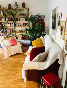 a room with a bed with pillows on it at Fior di Loto in Ravenna